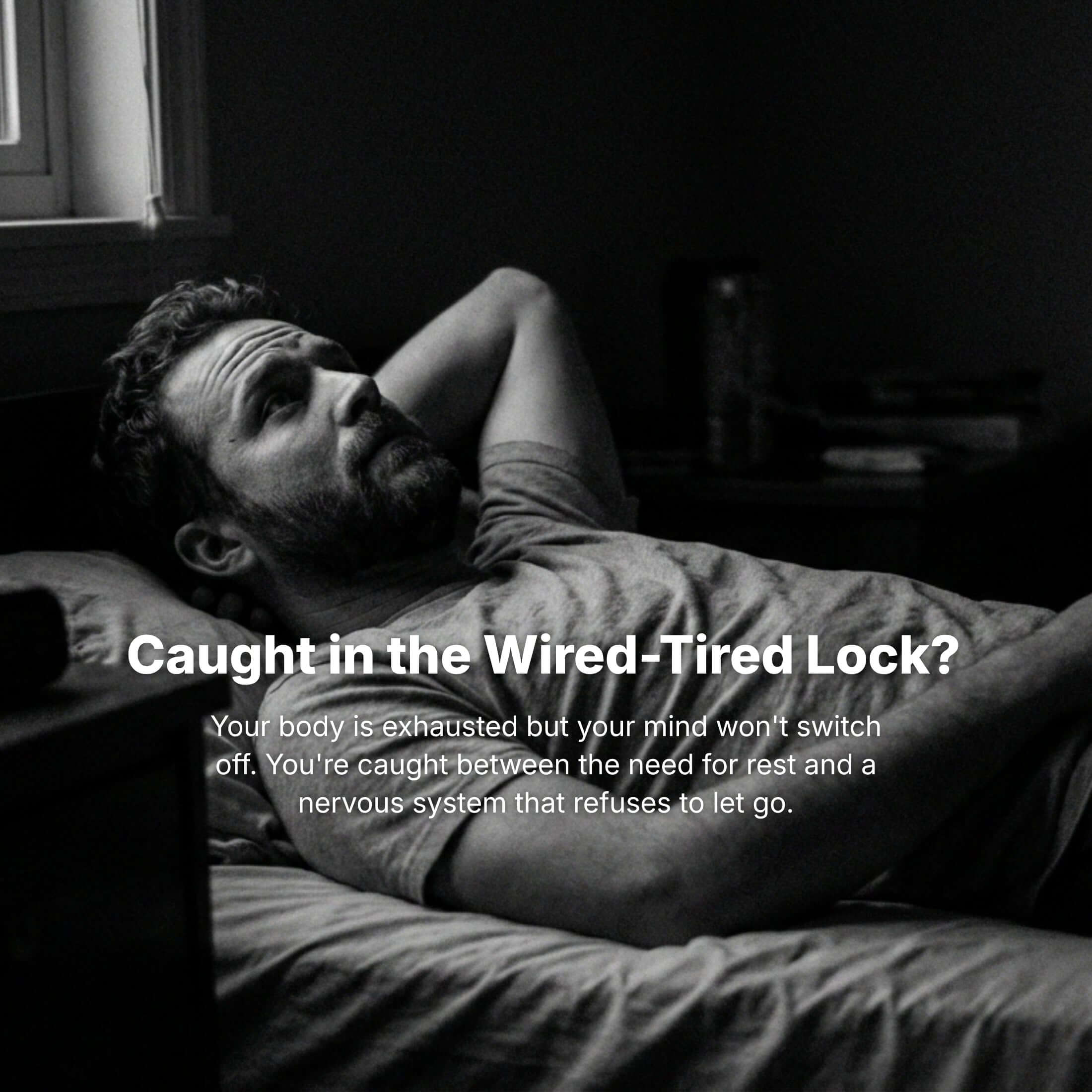 Man lying in bed looking tired, caught in wired-tired lock, experiencing exhaustion and restlessness.