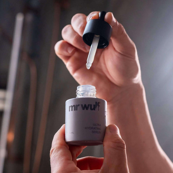 Mens skincare duo for dry skin featuring Mr Wulf Ultra Hydrating Serum being applied with a dropper.