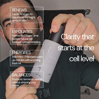 Man applying Mr WULF zest daily face cleanser for men during morning routine demonstrating gentle foaming action.